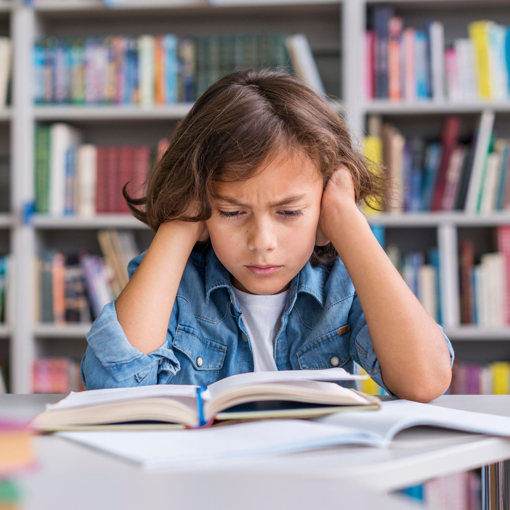 front-view-boy-thinking-hard-about-how-solve-his-homework