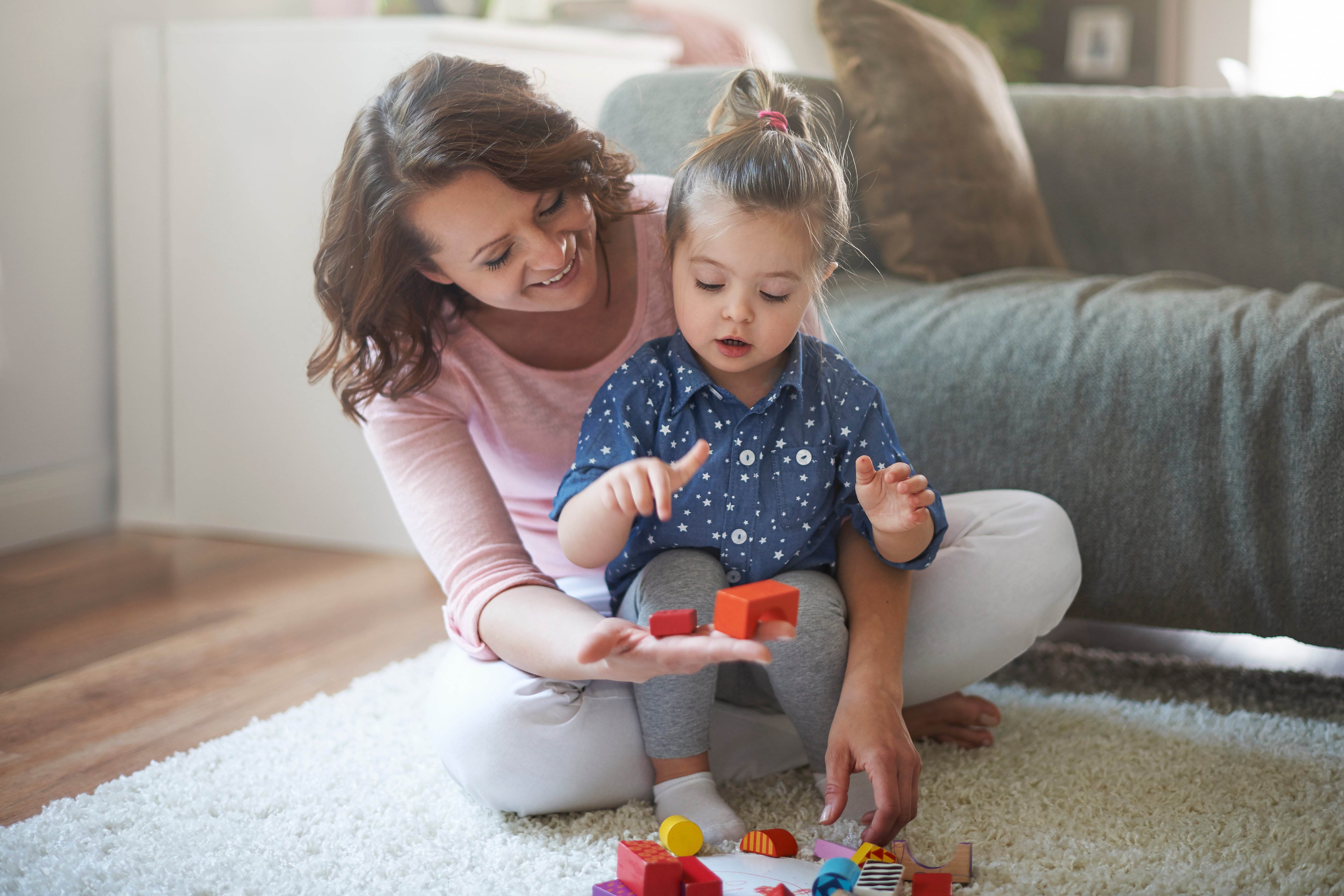 mother-daughter-playing-with-toys